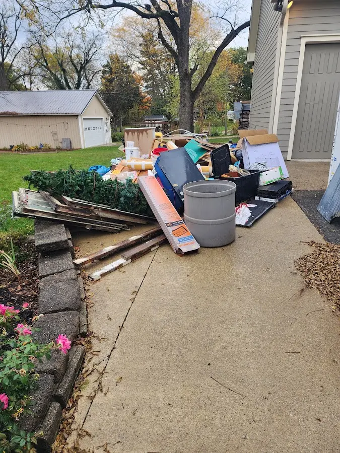 Dumpster being loaded with debris for 30 Yard Dumpster Rental in Albuquerque